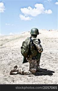 Soldier in the desert during the military operation