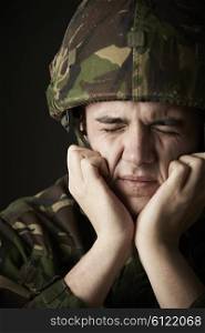 Soldier In Uniform Suffering From Stress