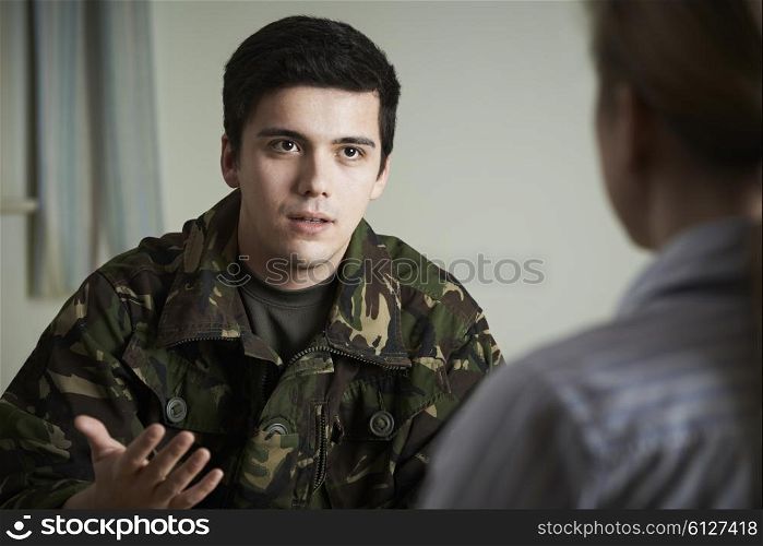 Soldier Suffering With Stress Talking To Counselor