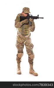 Soldier with rifle on a white background