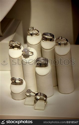 Solitaire Diamond engagement rings in a shop window