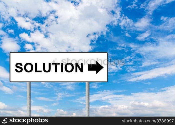 solution on white road sign with blue sky