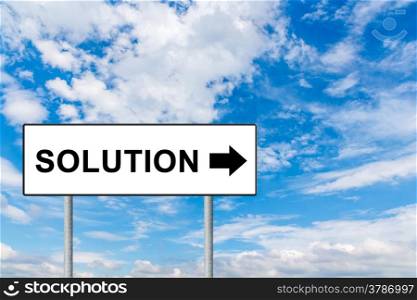 solution on white road sign with blue sky
