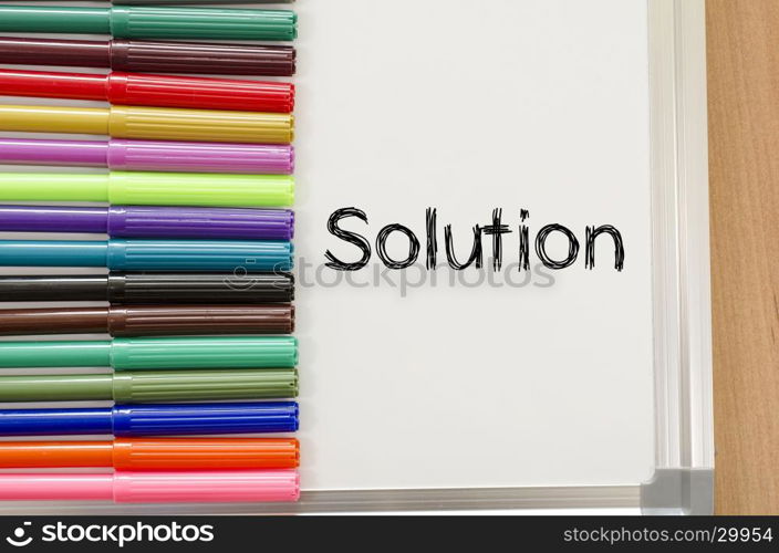 Solution text concept over whiteboard background
