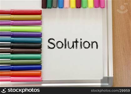 Solution text concept over whiteboard background