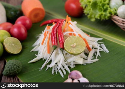 Som Tam Thai -Ingredients Papaya Salad Thai Food Style on wooden table background. Thai Food Concept.