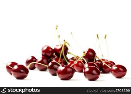 some cherries. some cherries on white background