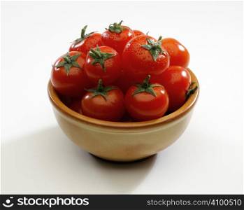 Some fresh cherry tomatoes in a bowl