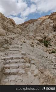 some of the 800 steps up to masada mountain in israel. steps to the top of masada mountain