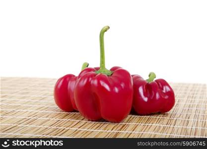 some peppers, isolated on white background