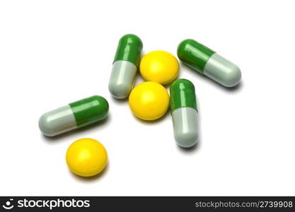 Some pills on white background