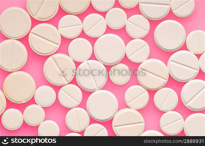Some pills over color background