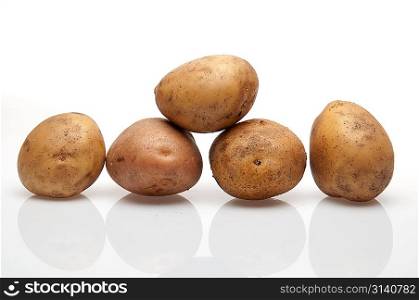 Some potatoes over white