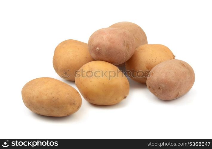 Some raw potatoes isolated on white