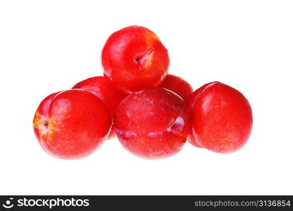 some red plums isolated on white