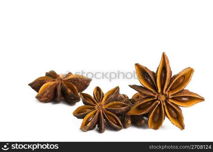 some star anise. some seasonal star anise on white background