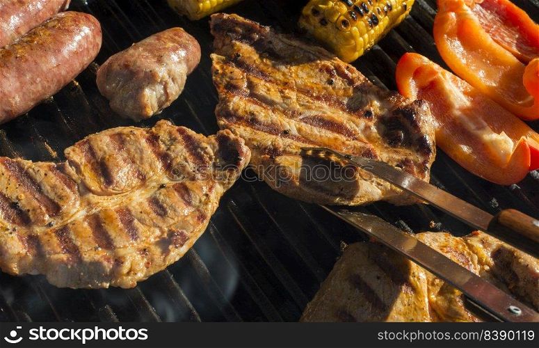 some steaks on a grill - BBQ