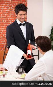 Sommelier presenting a wine