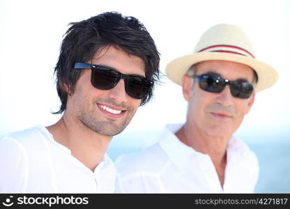 Son and father in summer