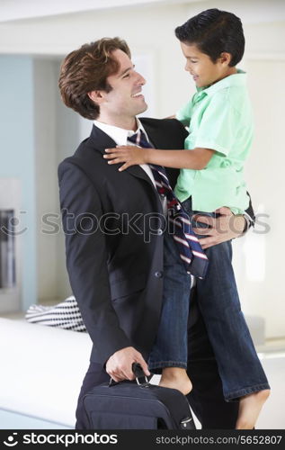 Son Greets Father On Return From Work