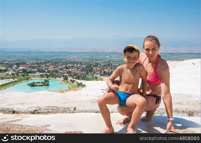 Son with mother in Pammukale near modern Turkey city Denizli, Turkey