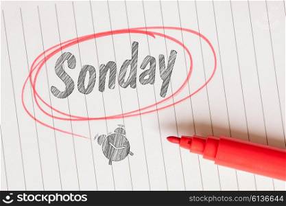 Sonday memo with an alarm clock sketch and a red marker