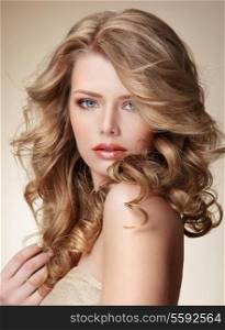 Sophisticated Woman with Perfect Skin and Flowing Blond Healthy Hair