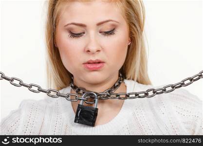 Sore throat, tonsillitis, health problems, lack of freedom concept. Woman having metal chain around neck. Woman having metal chain around neck