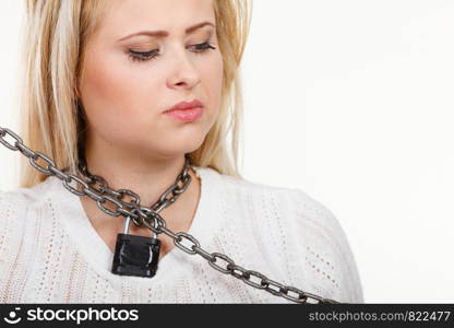 Sore throat, tonsillitis, health problems, lack of freedom concept. Woman having metal chain around neck. Woman having metal chain around neck