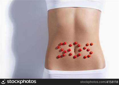 SOS sign on the stomach