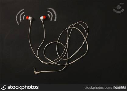 sound wave icon near earphone blackboard. High resolution photo. sound wave icon near earphone blackboard. High quality photo