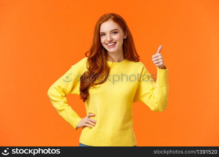 Sounds good, count me in. Waist-up shot cheerful upbeat girl make thumb-up gesture and smiling in approval, like idea, recommend consumer nice product, standing orange background. Copy space. Sounds good, count me in. Waist-up shot cheerful upbeat girl make thumb-up gesture and smiling in approval, like idea, recommend consumer nice product, standing orange background