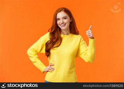 Sounds good, count me in. Waist-up shot cheerful upbeat girl make thumb-up gesture and smiling in approval, like idea, recommend consumer nice product, standing orange background. Copy space. Sounds good, count me in. Waist-up shot cheerful upbeat girl make thumb-up gesture and smiling in approval, like idea, recommend consumer nice product, standing orange background