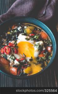 Soup of black beans and an egg