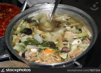 Soup on the stall of traditrional street market in Cambodia