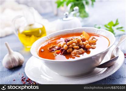 soup with bean and meat in the bowl