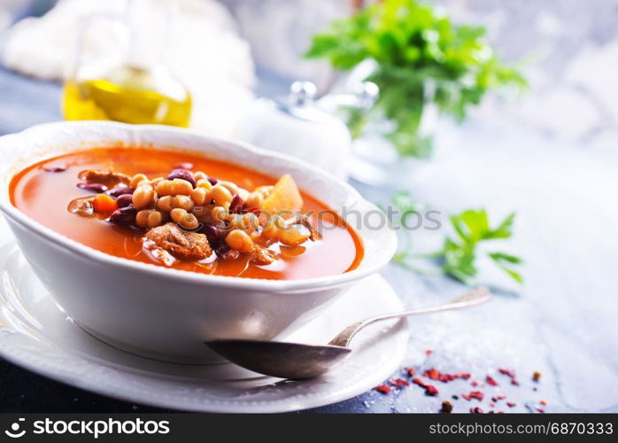 soup with bean and meat in the bowl