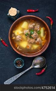 soup with meat balls. traditional Russian soup with meatballs and red pepper