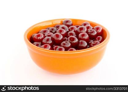 Sour cherry in a bowl isolated on white