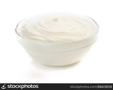 sour cream in bowl on white . sour cream in bowl on white background