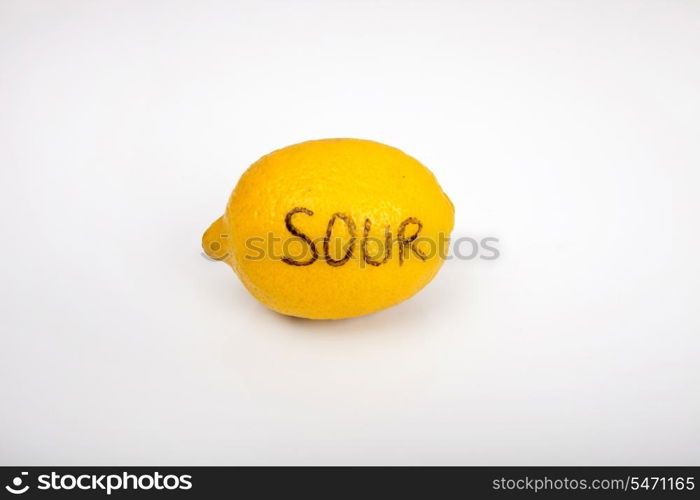 Sour lemon over white background