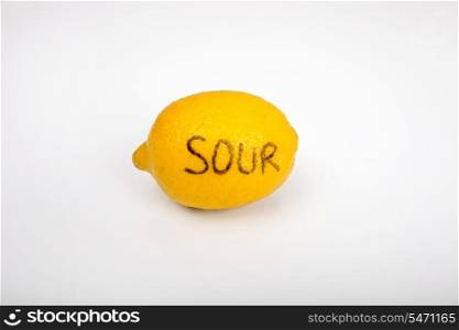 Sour lemon over white background