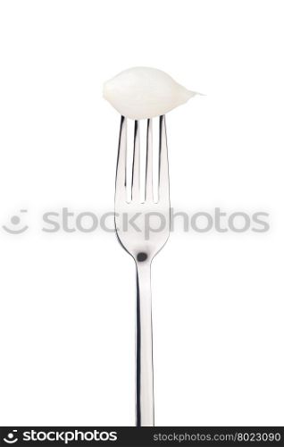 sour pickled onion on a fork. sour pickled onion on a fork. Isolated on a white background