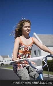 South Africa, Cape Town, girl riding bicycle