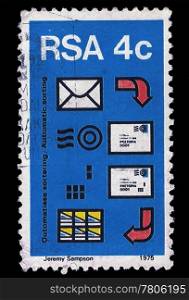 SOUTH AFRICA - CIRCA 1975: A stamp Printed in South Africa shows process of automatic mail sorting process, introduction of first automated sorter, circa 1975
