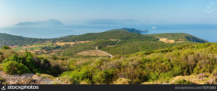 South cape of Lefkas island and lighthouse panorama (Lefkada, Greece, Ionian Sea). View from up.