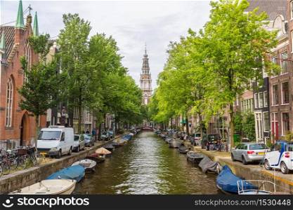 South Church Zuiderkerk and canal in Amsterdam in a beautiful summer day, The Netherlands