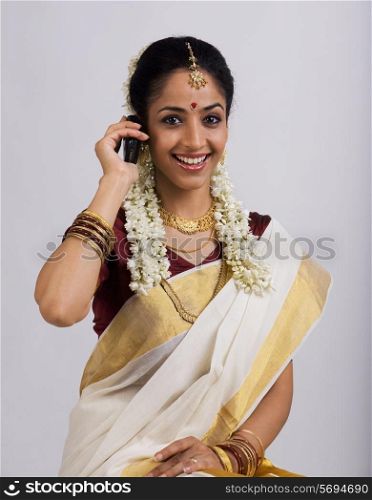 South Indian woman with cell phone