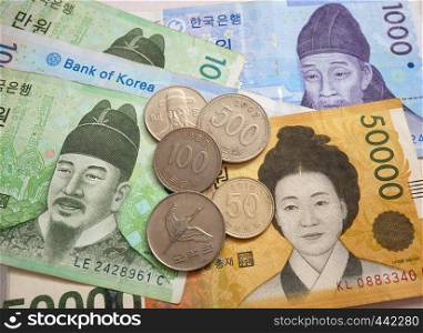 South Korean won banknote and coin as background. Finance business currency exchange concept.