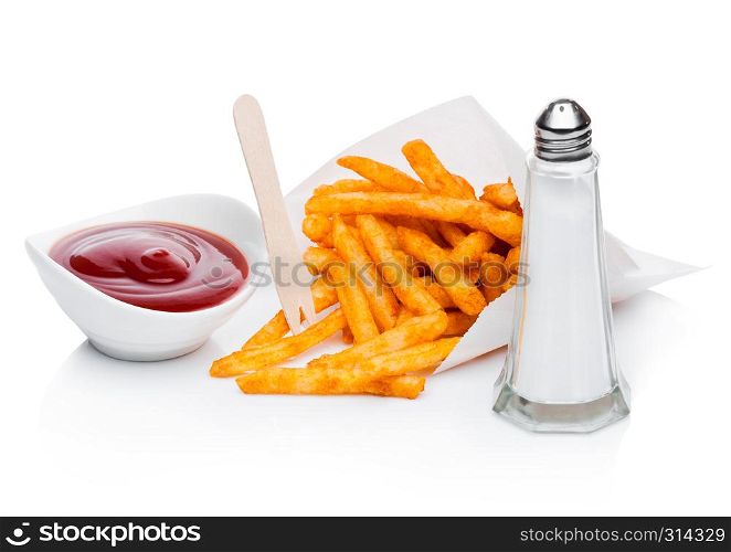 Southern french fries with ketchup and salt in paper container on white background